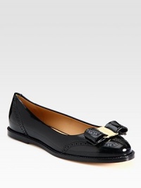 Classic functional silhouette of polished patent leather with a charming logo-adorned bow. Patent leather upperLeather lining and solePadded insoleMade in ItalyOUR FIT MODEL RECOMMENDS ordering true size. 