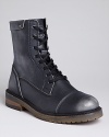 Diesel's rough-and-tumbled boots get tough with a distressed cap toe and punk-inspired laceup vamp.