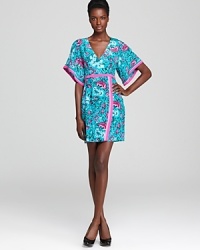 Channel the tropics in a bountifully printed Nanette Lepore dress with draped kimono sleeves and contrast trim. The faux-wrap silhouette, embellished with pleats at the front and back, is endlessly flattering on every silhouette.