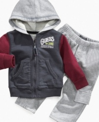 Get him ready for an active day in this comfortable hoodie and active pant set from Guess.