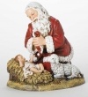 Snow Valley Kneeling Santa with Lamb Figurine