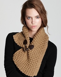 Toggle up on chilly days in this chunky neckwarmer from MICHAEL Michael Kors-the perfect accessory for a leather jacket.