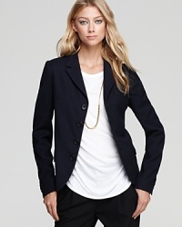 A classic must-own piece for fall, this shrunken wool Vince blazer flaunts a more feminine, cropped silhouette for topping off denim or mix-and-match suit separates.