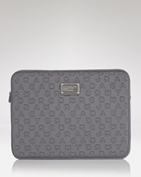 Upgrade your laptop case with this neoprene sleeve from MARC BY MARC JACOBS. It's sized right to slip inside your purse - but looks equally chic outside your it-bag.