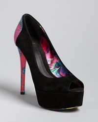 Riotous color defines these B Brian Atwood peep toe pumps, featuring bold soles and wildly chic, snake-embossed heels.