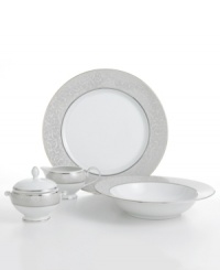 Clean and cool with an understated elegance, Mikasa's Parchment fine china dinnerware and dishes collection features a soft gray border embellished by an intricate scroll design. Accented by inner and outer borders of platinum. Dishwasher safe. 5-piece completer set features vegetable bowl, platter, covered sugar bowl and creamer.