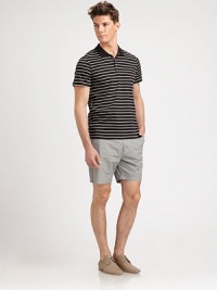 A traditional houndstooth pattern adorns these modern-fitting shorts, tailored in a cool, comfortable cotton for endless comfort and enjoyable moments all season long.Flat-front styleSide slash, back welt pocketsInseam, about 7CottonMachine washImported