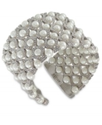 Light up the night. Carolee's wide cuff bracelet is crafted from silver-tone mixed metal with glass pearls and glass crystal accents adding a lustrous touch. Approximate diameter: 2-1/4 inches.