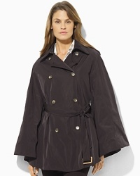 Constructed with a chic, cinchable waist and epaulets at the shoulders, a sophisticated taffeta poncho provides enduringly stylish shelter from the rain.