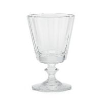 Crafted from gleaming hand-blown crystal, this hand-cut Ralph Lauren wine goblet boasts an elegant art deco-inspired base.