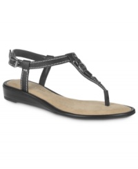 Simple, yet structured. Etienne Aigner's Danielle thong sandals fature contrasting stitching along the straps and well-placed buckle detailing along the front.