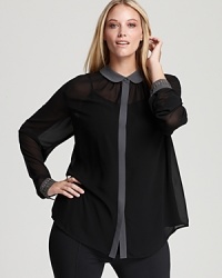 A dark palette and sheer styling infuse a demure DKNYC Plus tunic with sophisticated drama, while studded cuffs finish the style with rocker-chic shine.