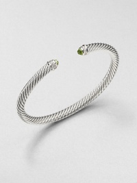 From the Cable Classics Collection. An iconic, sterling silver cable design accented with colorful peridot and sparkling diamonds. PeridotSterling silverDiamonds, .09 tcwDiameter, about 2.25Slip-on styleImported 