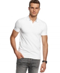 White out. Hit the Hamptons with surefire style wearing this Calvin Klein CK One polo shirt. (Clearance)