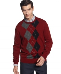 Classic has never looked so good with this argyle sweater from Geoffrey Beene.