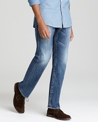 An easy-going pair of jeans maintains your laid-back style with slight fading and a versatile straight fit.