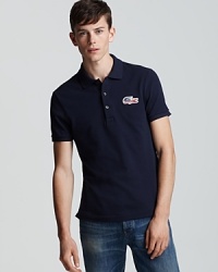 Express your enthusiasm for the U.S. team with this slim-fitting Lacoste polo. Long after the Olympics are over, the oversized patriotic croc will remain in style.