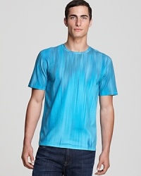 A blurred tonal effect produces graduated stripe patterns on this artful tee designed by Elie Tahari, a new and modern dimension for your everyday wardrobe.