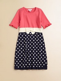 Polka dots and a charming bow breathe new life into this charming knit frock.ScoopneckShort sleeves with ruffled cuffsPullover styleWaistband with bow detailCottonMachine washImported