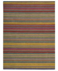 True colors. With vivid stripes in hues like marigold, ruby and sage, Nourison's irresistible Skyland rug is an instant mood-lifter in any space. The plush wool rug is enhanced with meticulous hand carving for beautiful detail and texture. (Clearance)