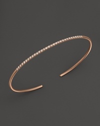 A simply modern diamond bangle in 14K rose gold from Meira T.