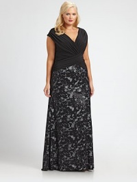 Made from soft jersey, this gown features a pleated bodice and printed skirt. You will adore the way the bodice complements your shape.V-necklineCap sleevesPleated bodiceRuched details at back zipperFully linedAbout 49 from natural waistBodice: polyester/spandexSkirt: viscose/elastaneDry cleanImported