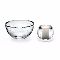 Kate Spade and Lenox join together to bring ease, elegance and understated wit to the table. The crystal giftware line reflects kate's appreciation for elegance and beauty. Larabee Dot features frosted dots on crystal.