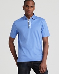 An essential polo gets a tweak from Michael Kors with check contrast details at the placket and under-collar, tailored for a slim, modern fit.