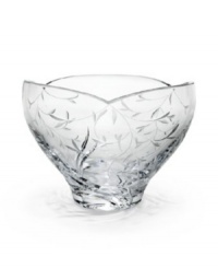 A delicate, etched vine motif and an asymmetrical rim infuses your décor with a gentle sophistication.