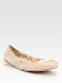 Patent leather scrunch ballet flats with criss-cross elastic detail. Patent leather upperLeather liningRubber solePadded insoleImportedOUR FIT MODEL RECOMMENDS ordering one half size up as this style runs small. 