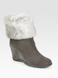 Luscious rabbit fur upgrades this casual suede boot with a versatile fold-over shaft. Hidden wedge, 3½ (90mm)Unfolded shaft, 9Leg circumference, 12Weatherproof suede upper with faux fur trimBack zipBreathable microfiber liningSlip resistant rubber solePadded insoleMade in Italy