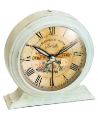 Featuring a distressed metal exterior, this elegant alarm clock lends your desk or bedside table an old-world style that's uniquely Parisian. Its traditional face has an antique quality, graced with a rosy bouquet and the French saying, Le Boutique de Fleurs.