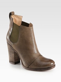 Simply cool distressed leather favorite with a towering stacked heel. Stacked heel, 3¾ (95mm)Distressed leather upper with side elastic goresPull-on styleLeather lining and solePadded insoleImportedOUR FIT MODEL RECOMMENDS ordering true size. 