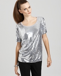 Whether on its own or under a fitted leather blazer, this MICHAEL Michael Kors sequin top injects your look with downtown dazzle.