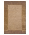 A looped center of mottled tones is framed by rich color in tufted pile, presenting a modern area rug that is both casual and practical. Hand tufted in India of pure wool fibers, the Madrid area rug is a comforting, stylish addition to any decor.