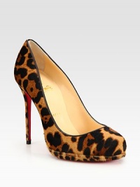 Leopard-print pony hair adds exoticism to this platform pump with leather trim and a signature red leather sole. Self-covered heel, 4½ (115mm)Covered platform, ½ (15mm)Compares to a 4 heel (100mm)Leopard-print pony hair upperLeather liningSignature red leather solePadded insoleMade in ItalyOUR FIT MODEL RECOMMENDS ordering one half size up as this style runs small. 