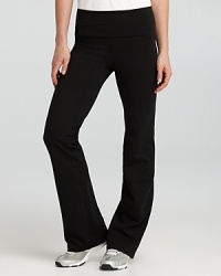 SPANX® ACTIVE's flattering pants with subtle smoothing at the waist are an on-the-go staple. Smoothing Slim-X® belly-buster waistband keeps tummy tight. Flattering fabric eliminates lumps and bumps. Flared leg and back seams visually slim silhouette.