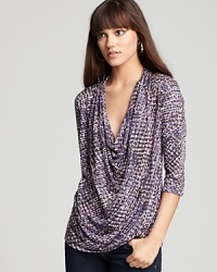 A stylishly draped cowl neck and mesmerizing snake print raise elevate the wow factor of this Soft Joie top.