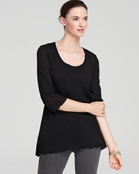 Brimming with urban flair, this Miraclebody by Miraclesuit top flaunts a chic trapeze silhouette for a modern statement.