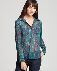 A sheer sensation, this printed GUESS top, features a lush, two-toned swirl of colors and a chic high/low hem.