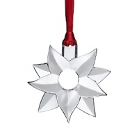 Delightfully heritage-minded yet modern and whimsical, this crystal poinsettia is the 2012 annual ornament from Orrefors. Continue the tradition - or start a new one.