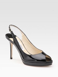 From the 24:7 Collection. High shine, high style, a modern classic in sleek patent leather. Self-covered heel, 4 (100mm) Covered platform, ¾ (20mm) Compares to a 3¼ heel (80mm) Peep toe Adjustable strap Leather lining and sole Made in ItalyOUR FIT MODEL RECOMMENDS ordering true size.. 