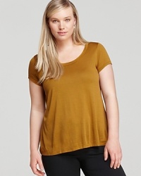 A vivid jewel tone lends luxe appeal to a classic Eileen Fisher Plus tee. Set off the shade with sleek separates and turn heads in brilliant color.