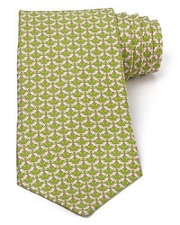 A pattern of repeating beach chairs emphasizes your interest in getting a little R & R as soon as possible. In the meantime, this refined tie will have to do. Crafted in pure Italian silk for a luxurious addition to your collection.