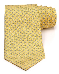 A silk tie adds distinction and flair to your formal presentation. With a repeating pattern of flowers, you'll also punch up your attire with a bit of handsome elegance.