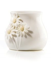 Sculpted black-eyed Susans pop with a tinge of yellow against the glossy white Flora votive holder. A quiet beauty in graceful Lenox porcelain.