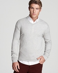 A lightweight sweater from Theory works in the office and after hours, perfect with a handsome button-down.