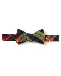 Pep up your look with a preppy Tartan plaid bow tie, clever and colorful anywhere you go.