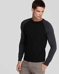 Theory embellishes a rich merino/yak wool blend with a two-tone hue and raglan sleeves for trend cred this season.