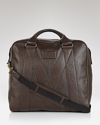 Stow a change of clothes and that novel you've been itching to read inside this refined leather holdall, designed with a subtle, stitched M on the exterior for a signature designer touch, perfect for a trip out of town. From MARC BY MARC JACOBS.